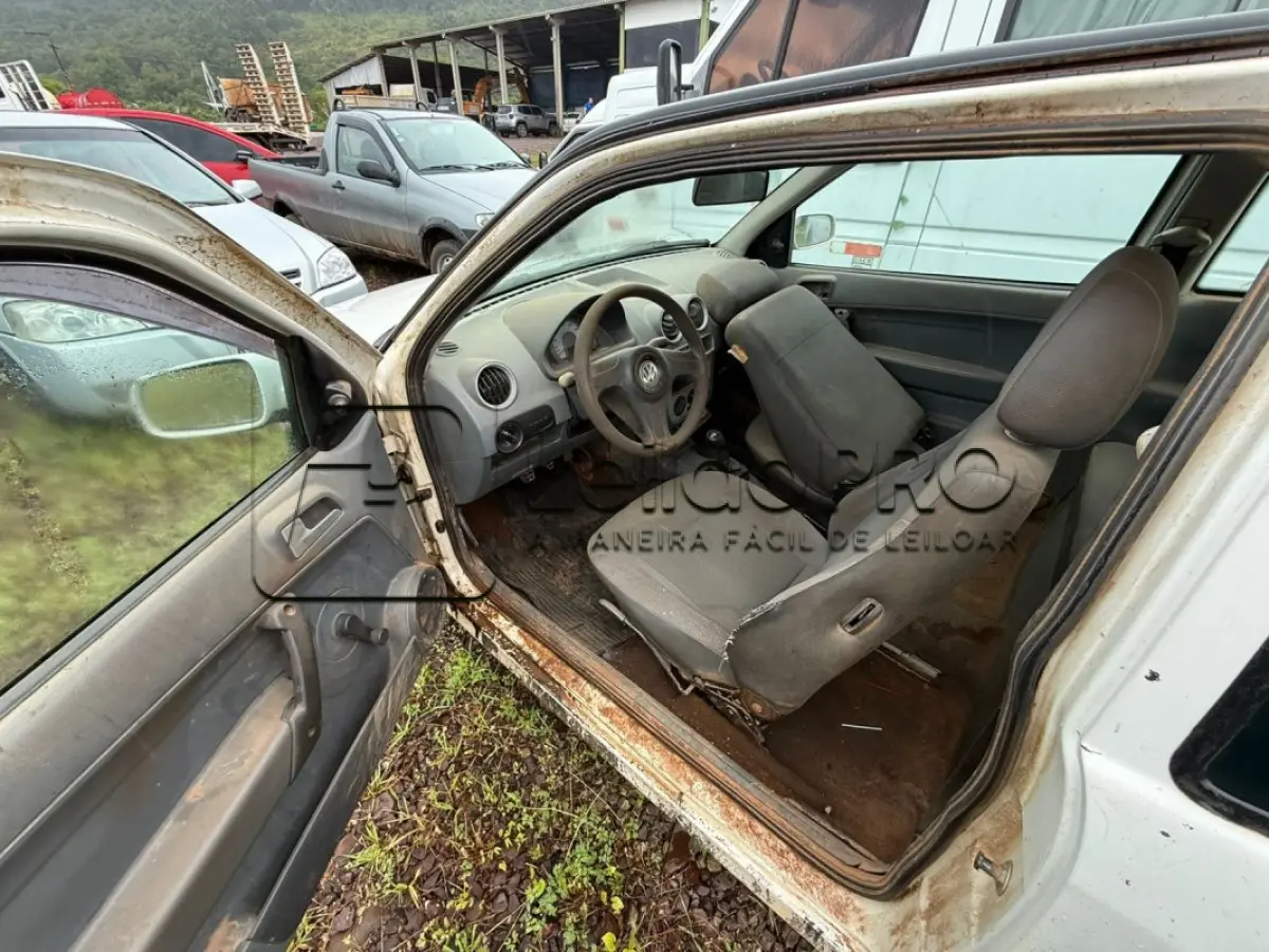 LOTE 011 - VW GOL 1.0 GIV,  2 PORTAS, ALCOOL/GASOLINA, BRANCA, ANO 2009/2010.