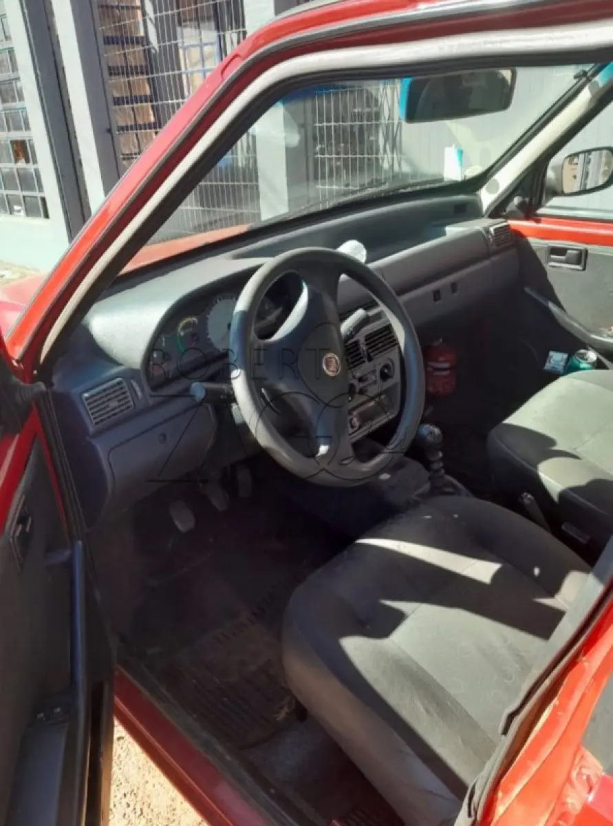 LOTE 005 - Veículo Fiat/Uno Mille Way Econ, placas IRM3288, vermelho, 2010/2011, 4 portas.