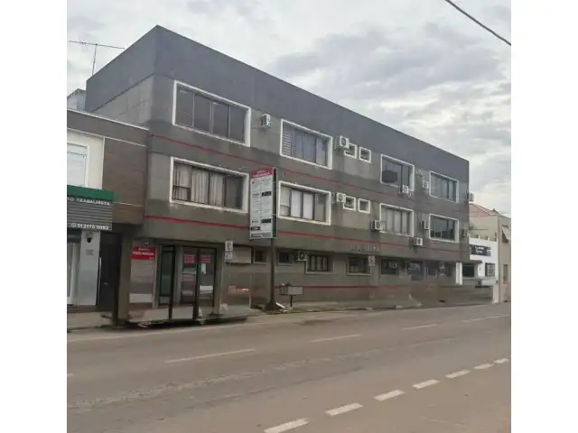 Direitos e Ações: Sala Comercial 203 do Ed. Fisiocamaquã na Rua Júlio de Castilhos nº 254 no Centro da Cidade de Camaquã