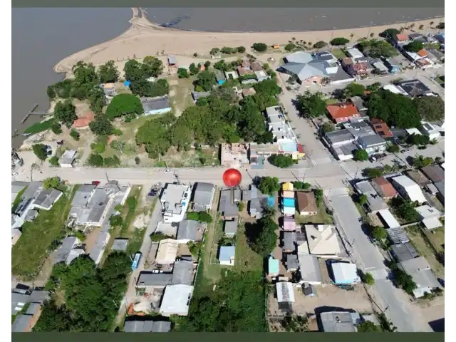50% do imóvel : Lote urbano número 19-A (dezenove-A) da quadra número 18 (dezoito) com área de 572,48m² , com frente para a rua Irineu Atahualpa Cibils, no bairro Centro, na cidade de Arambaré-RS