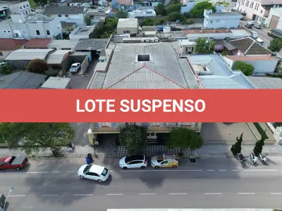 LOTE 001 - 13,474% do PRÉDIO DE ALVENARIA N° 1.229, situado na Av. Olavo Moraes, na cidade de Camaquã.