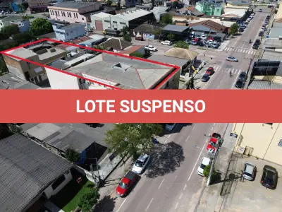 LOTE 001 - 13,474% do PRÉDIO DE ALVENARIA N° 1.229, situado na Av. Olavo Moraes, na cidade de Camaquã.
