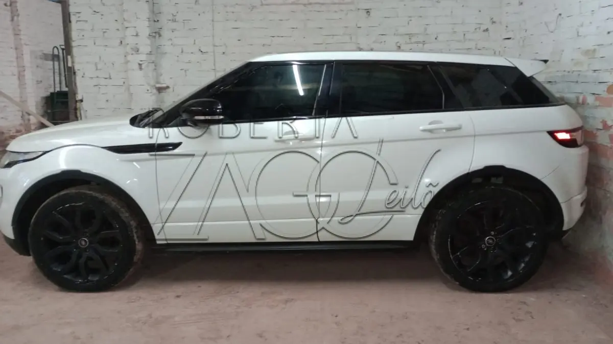 LOTE 016 - Automóvel I/LR Evoque Dynamique 5D, placa MLL-1328, ano/modelo 2013/2013, cor branca.