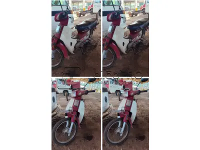 LOTE 006 - Motocicleta Honda Dream C100 – cor vermelha, ano, modelo 1994.