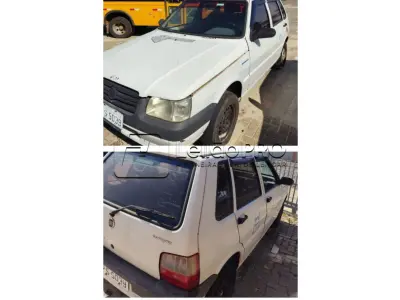 LOTE 003 - Um veículo Fiat Uno Mille, cor branca, ano/modelo 2009/2010