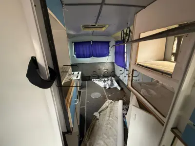 LOTE 003 - VEÍCULO MICROÔNIBUS AMBULÂNCIA, FIAT IVECO, MODELO COMIL BELLA M, DIESEL, CAP. 6,2 TON, 122 CV, COR BRANCA, ANO DE FABRICAÇÃO 2003, MODELO 2004