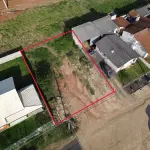 LOTE 001 - Imóvel - Lote urbano número quinze (15), na Quadra número (669), sem benfeitorias, na Rua Assis Brasil, no “Loteamento Urbanização Falcão Park”