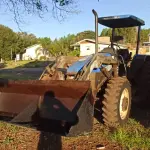 LOTE 007 - Trator Agrícola New Holland - Modelo TL 75E - 4X4 - Ano/Modelo:  2009/2009 - Cor: Azul - Combustível: Diesel -