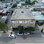 LOTE 001 - 13,474% do PRÉDIO DE ALVENARIA N° 1.229, situado na Av. Olavo Moraes, na cidade de Camaquã.